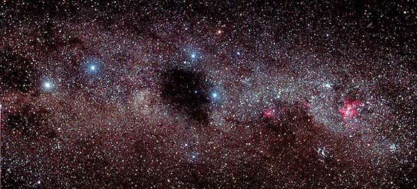 From left, Alpha and Beta
Centauri, dark Coal Sack nebula, Southern Cross (Beta Crux, Alpha Crux 
(blue-ish), Gamma
Crux (orange), Delta Crux), Eta Carinae nebula (large pink blob).